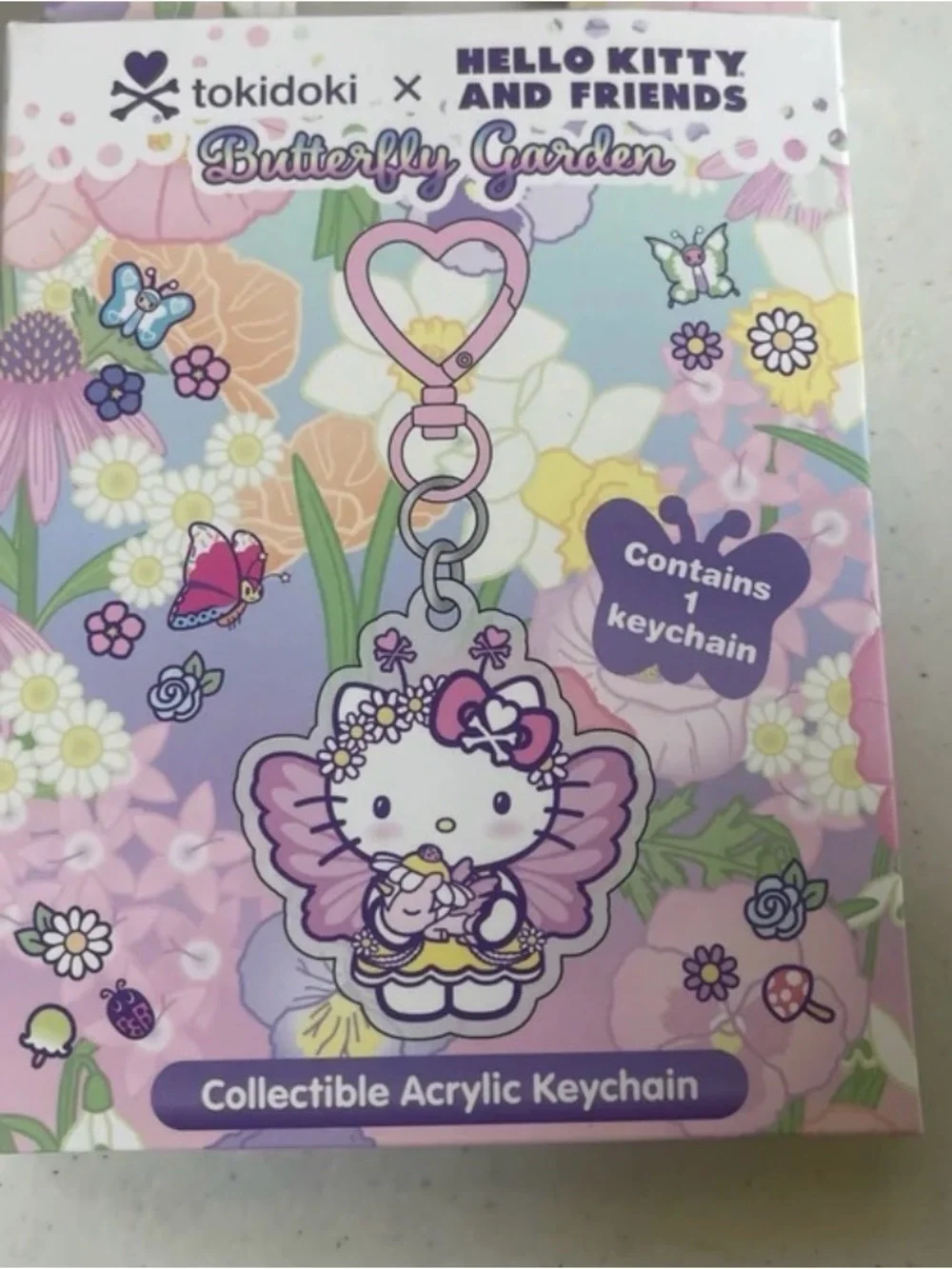 tokidoki Hello Kitty Butterfly Garden Acrylic KuromiKeychain in Pink and Purple